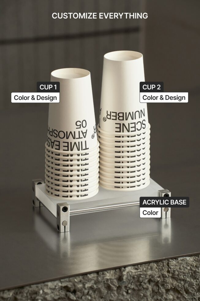 Two cream paper cups on metal base with labels showing color customization options