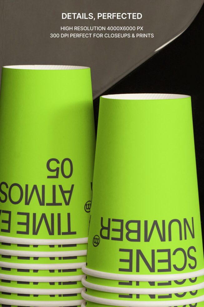Bright lime paper cups stacked with black text, white rim bands visible