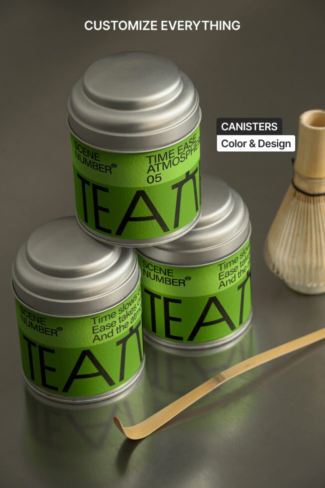 Three metallic canisters stacked diagonally, showing customizable label design options