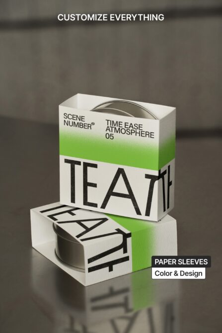 Stacked tea packaging showing paper sleeve label design detail