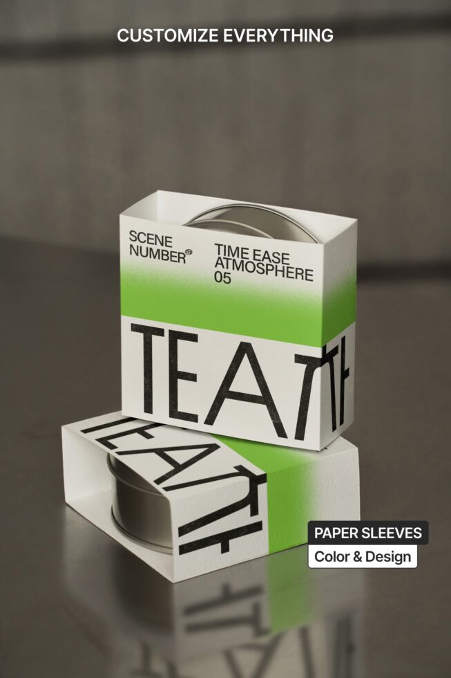 Stacked tea packaging showing paper sleeve label design detail