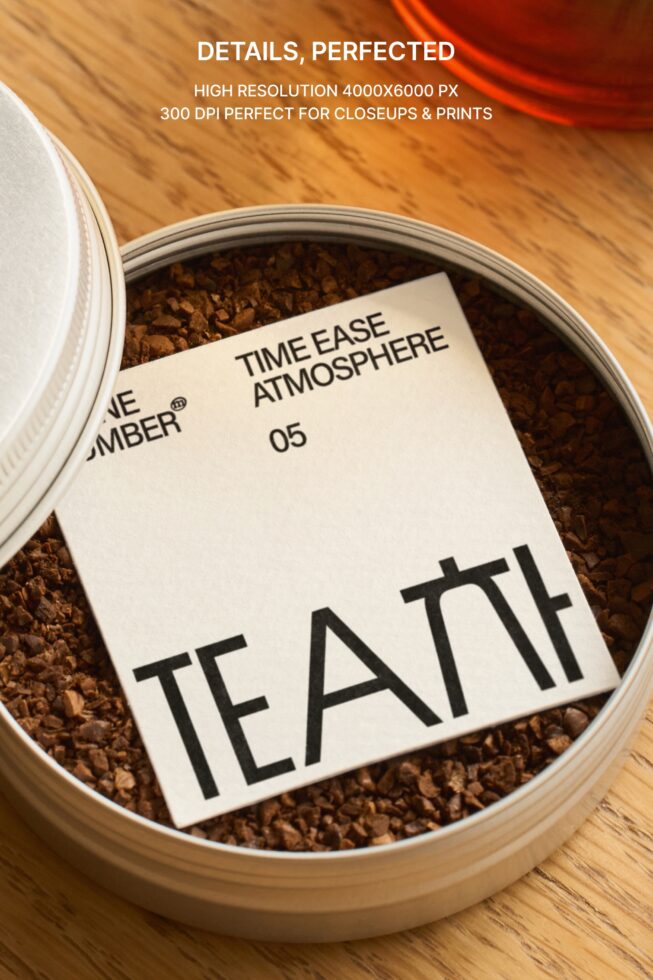 Loose tea label inside open jar showing brown tea leaves close-up