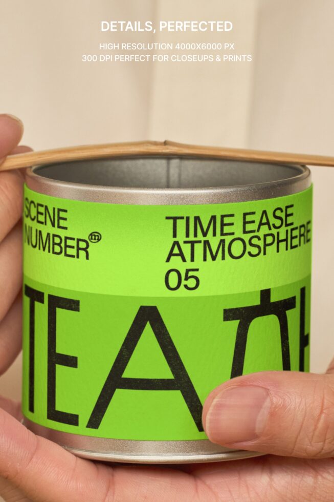 Close-up of bright green tea canister with wooden lid held in hand