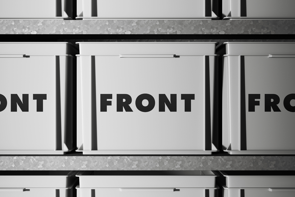 White stacked boxes with black text on clean minimalist backdrop