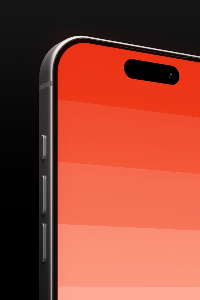iPhone detail shot with orange red gradient background, notch visible at top corner