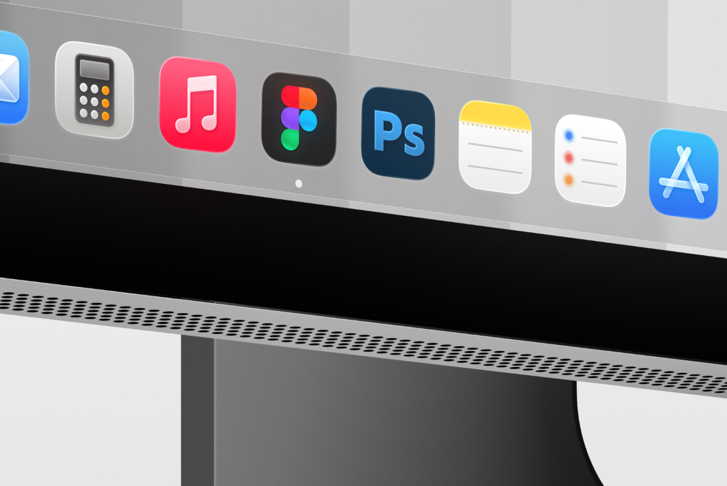 Monitor dock showing app icons including Figma, Photoshop, music, calculator, task management