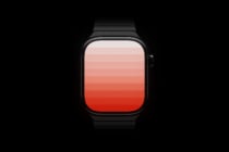 Black smartwatch with red gradient display on dark background