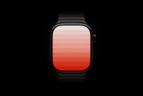 Black smartwatch with red gradient display on dark background