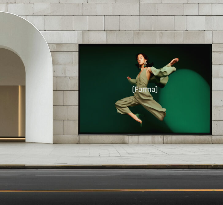 Storefront display with woman in beige jumpsuit mid-leap against green circle backdrop