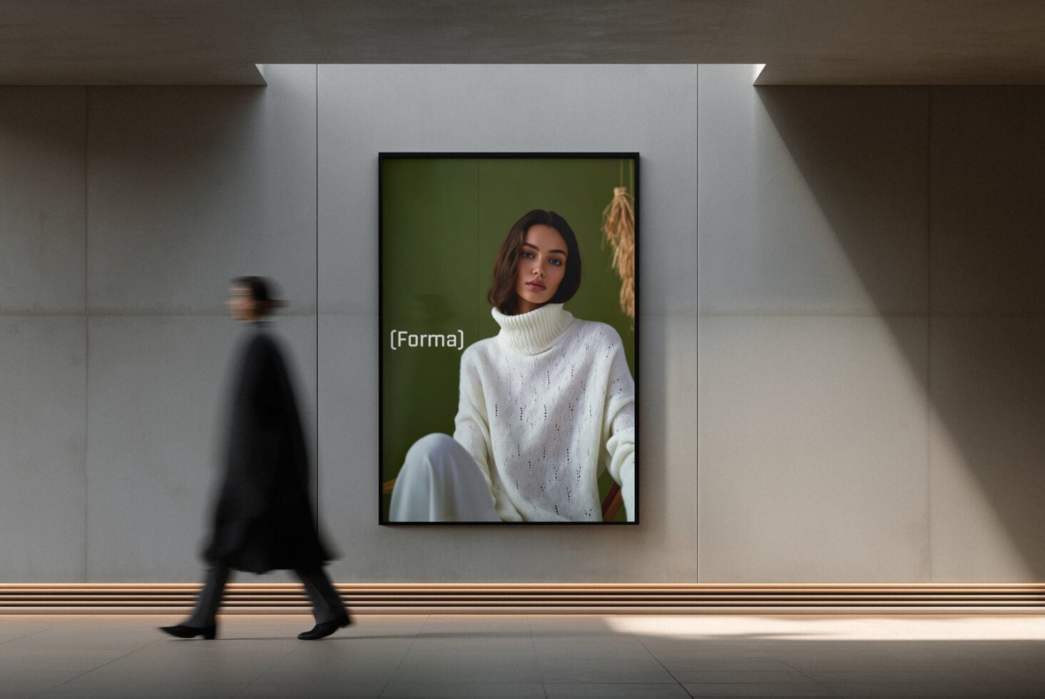 Portrait photo in black frame on white wall with green background