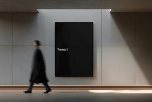 Empty black frame mockup on gallery wall with natural light