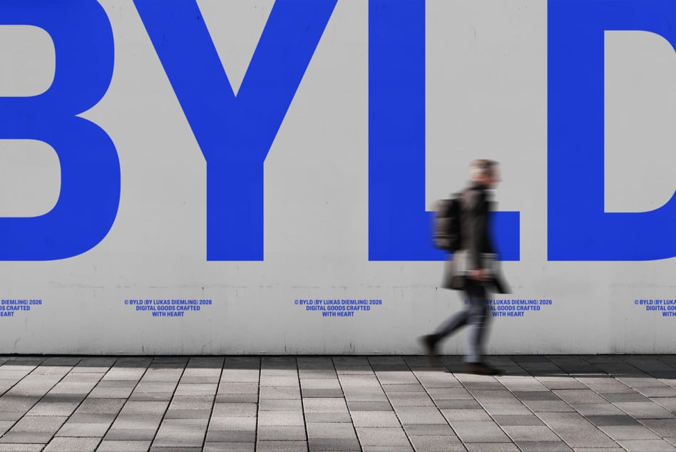 Blurred runner moving past large blue BYLD typography on wall