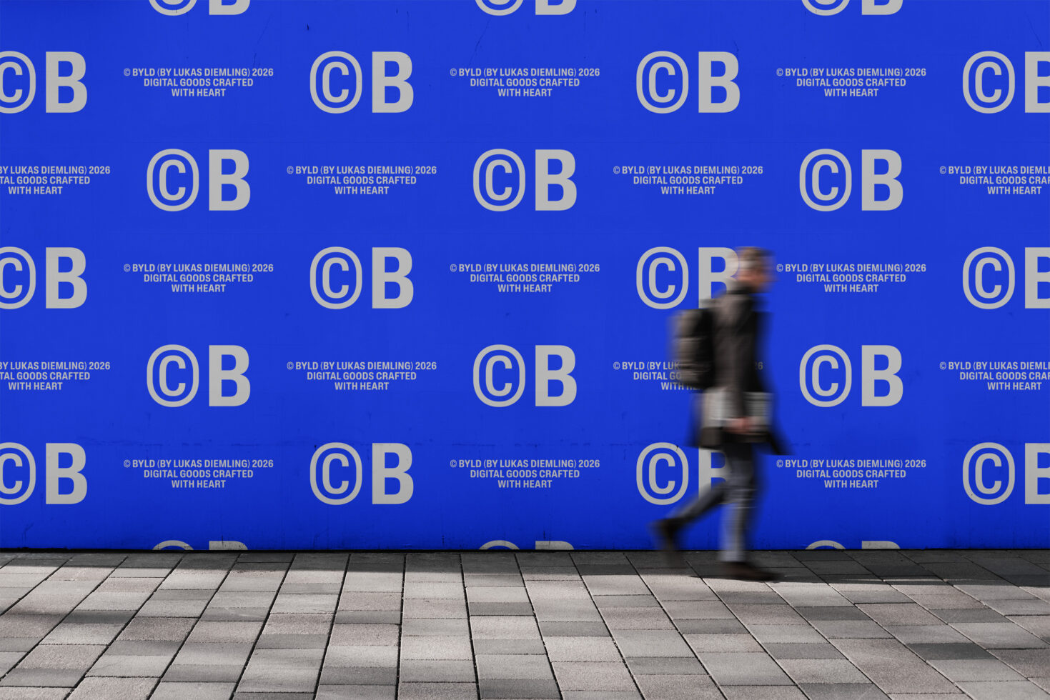 Blurred person passing blue wall with repeating CB logo pattern