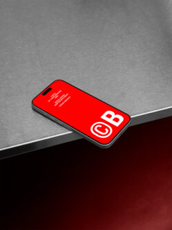 iPhone mockup with red screen displaying BYLD branding logo