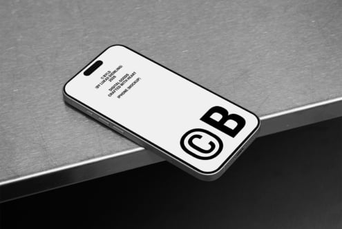 iPhone mockup with white background showing copyright text on screen