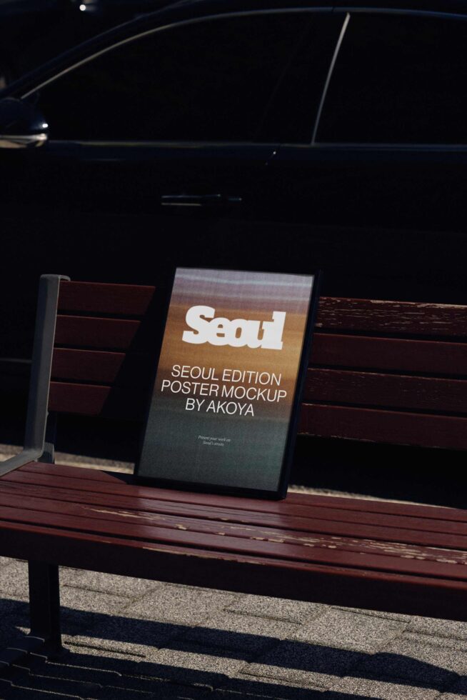Seoul Edition poster mockup leaning on wooden bench at night with gradient design