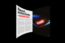 Open magazine spread in dark space with neon glowing colors