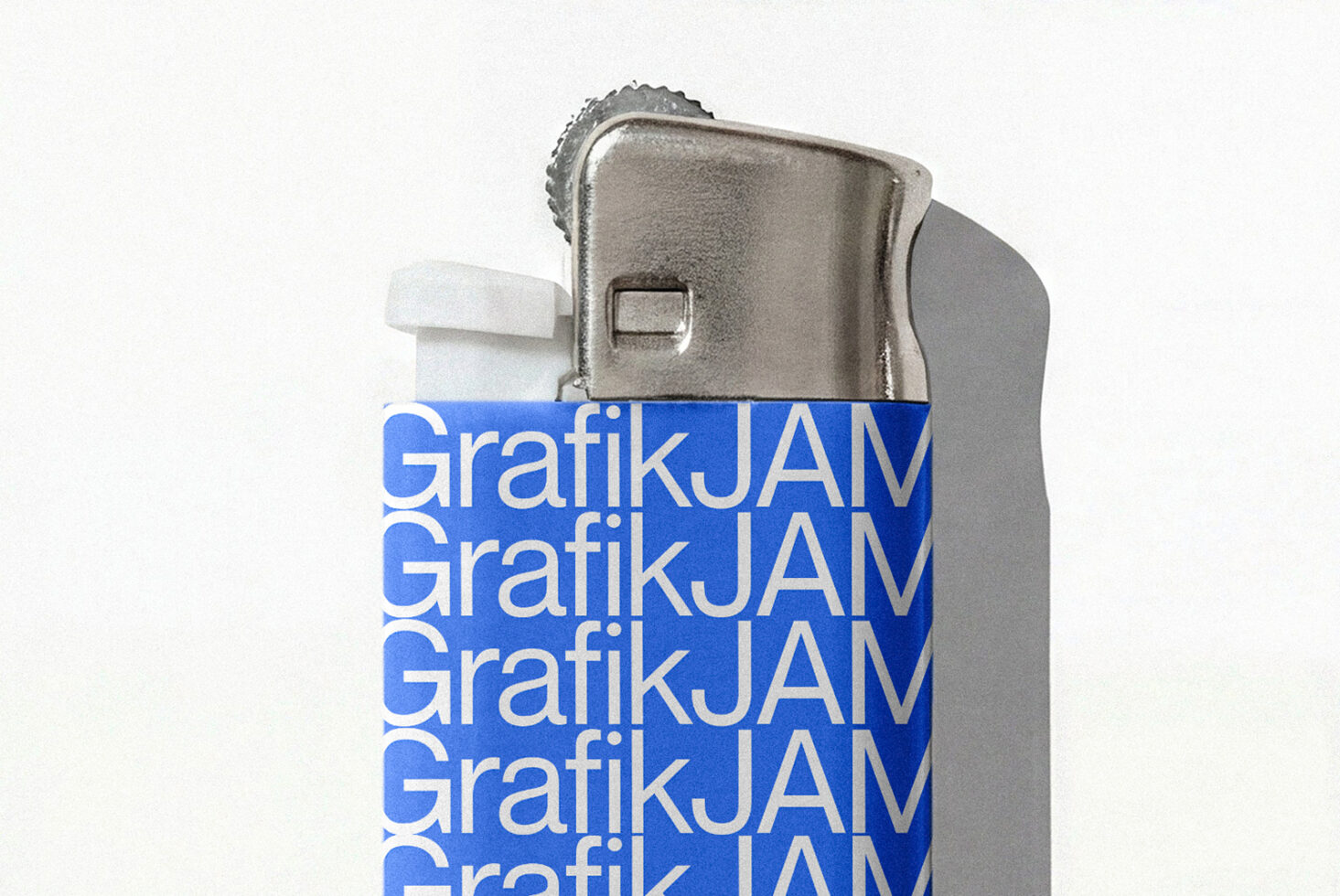 Vintage camera with blue box showing repeated GrafikJAM branding stacked vertically