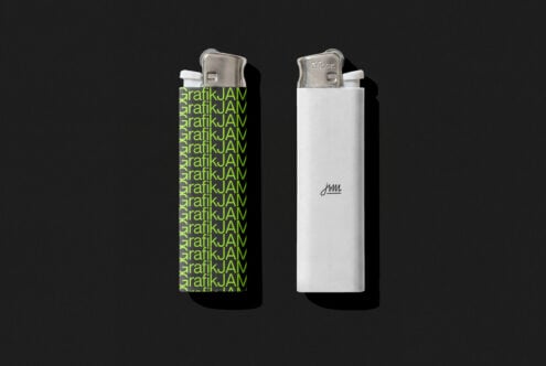 Two lighters side by side with neon green, white wrap designs on dark background