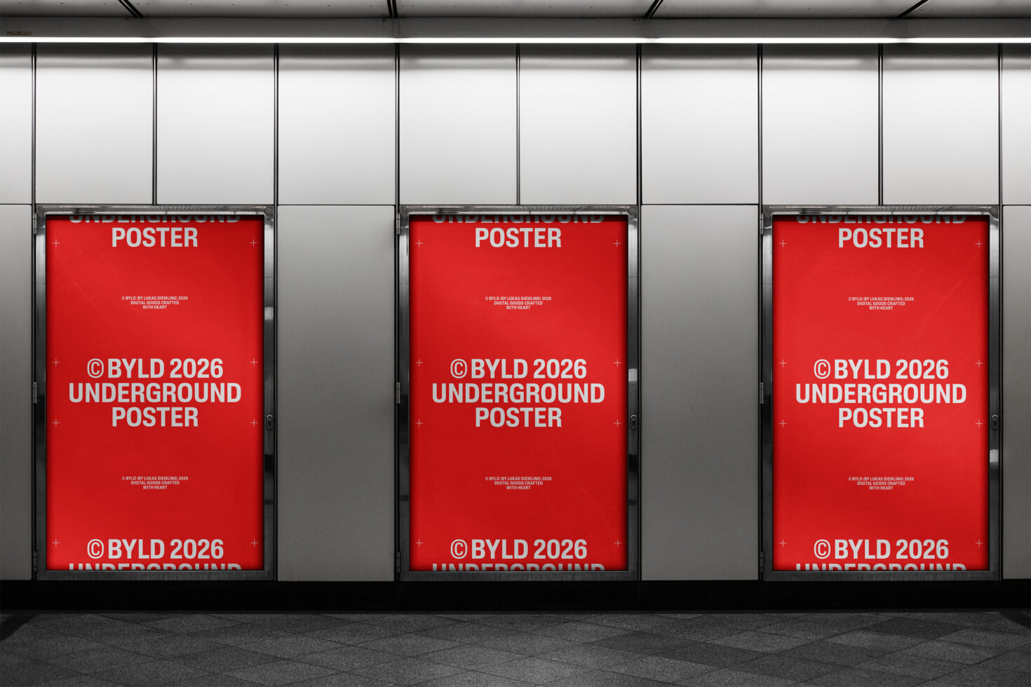 Three red posters in metal frames showing BYLD 2026 Underground Poster branding