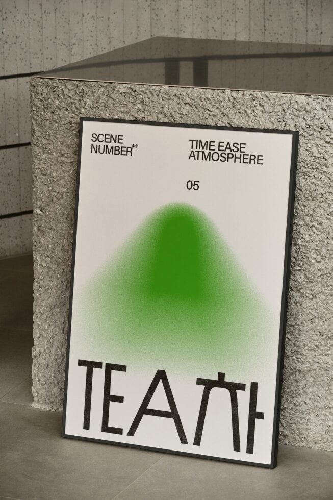 Framed Scene Number poster in black frame against concrete wall backdrop
