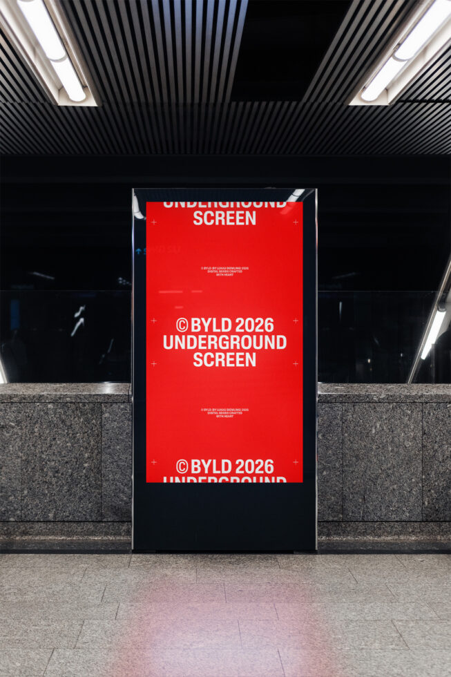 Red digital display screen in subway station with white text repeating BYLD 2026