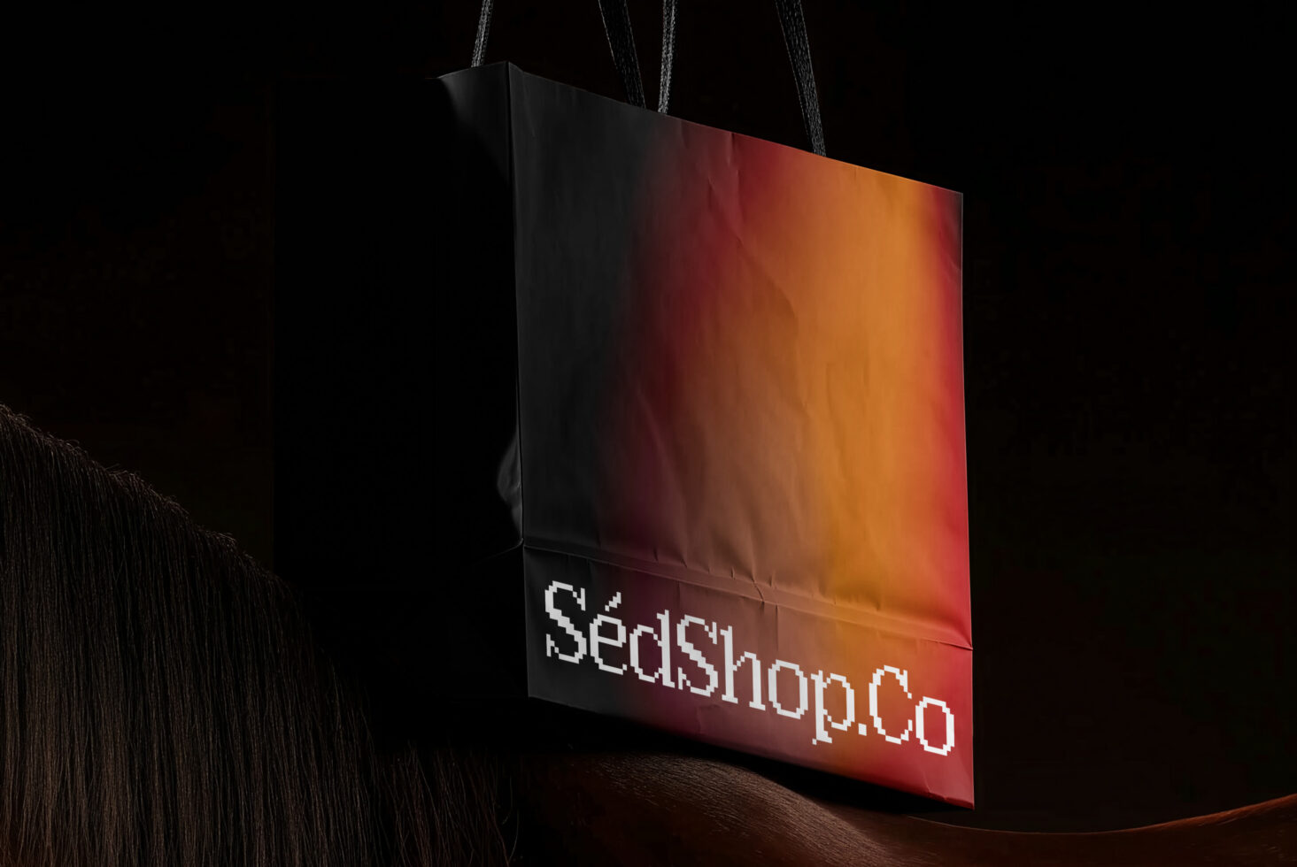 Wide angle view of gradient shopping bag with warm fire-like colors