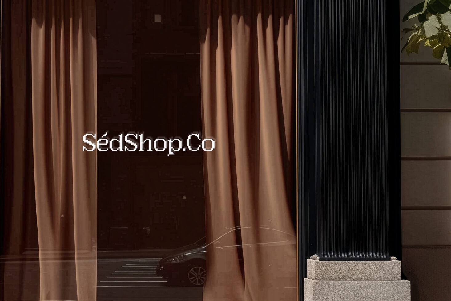 Luxury showroom window with dramatic curtains showing pixel-style typography