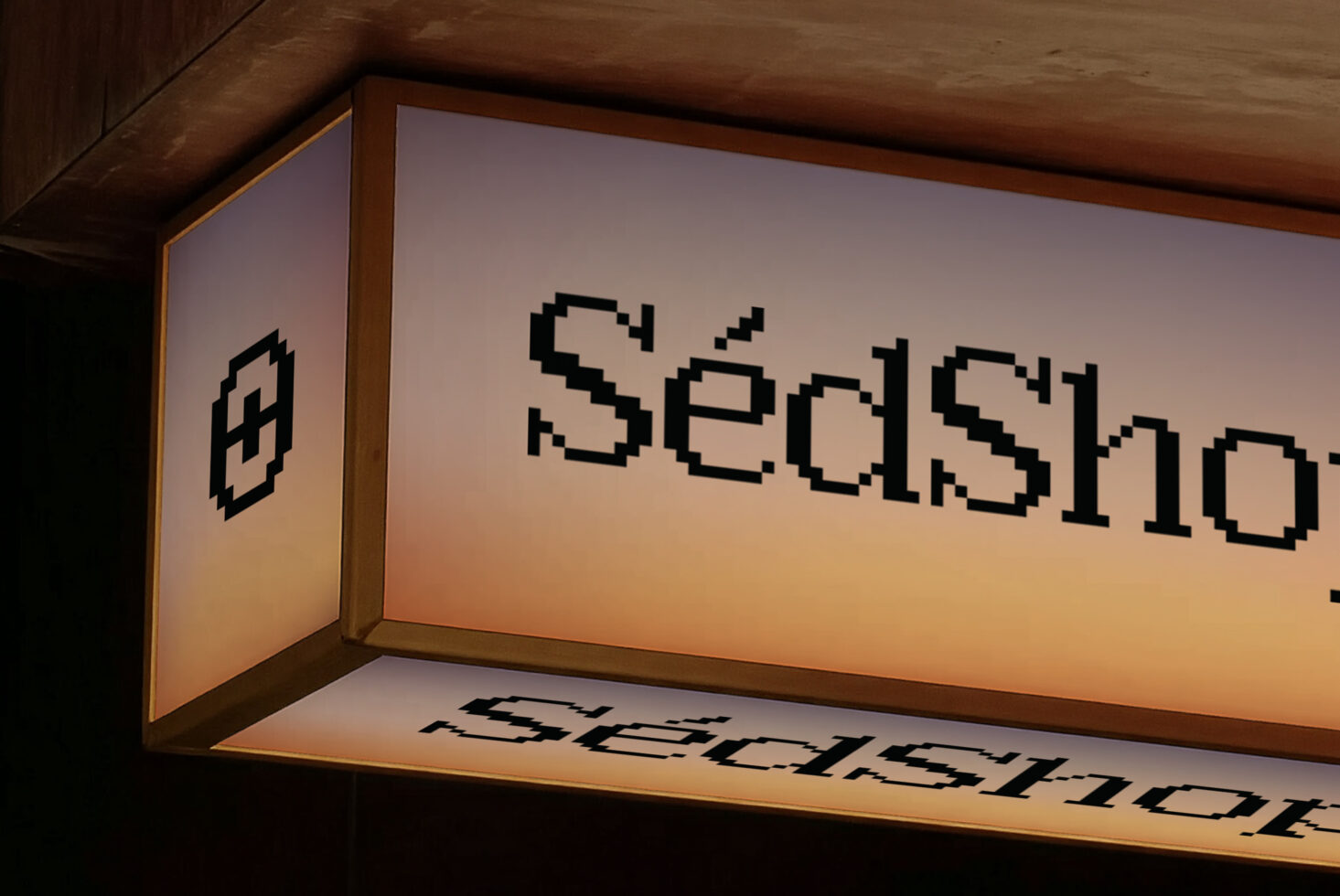 Glowing corner sign showing SedShop.Co in pixelated font with sunset gradient
