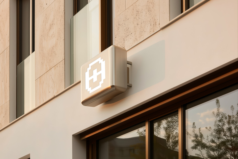 Cream 3D sign with medical cross icon mounted on storefront