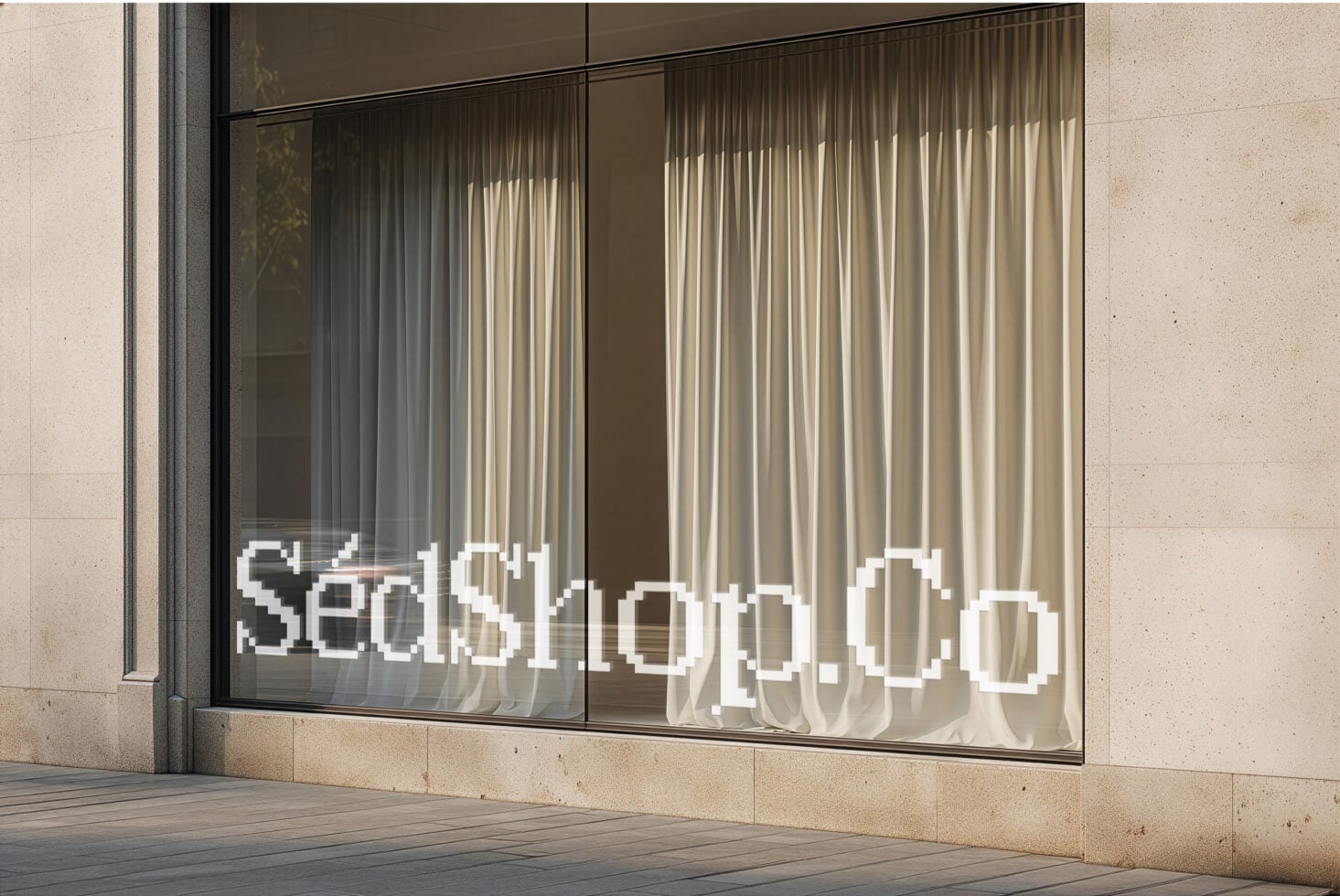 Storefront glass showing curtains inside, white pixelated text at bottom, natural light
