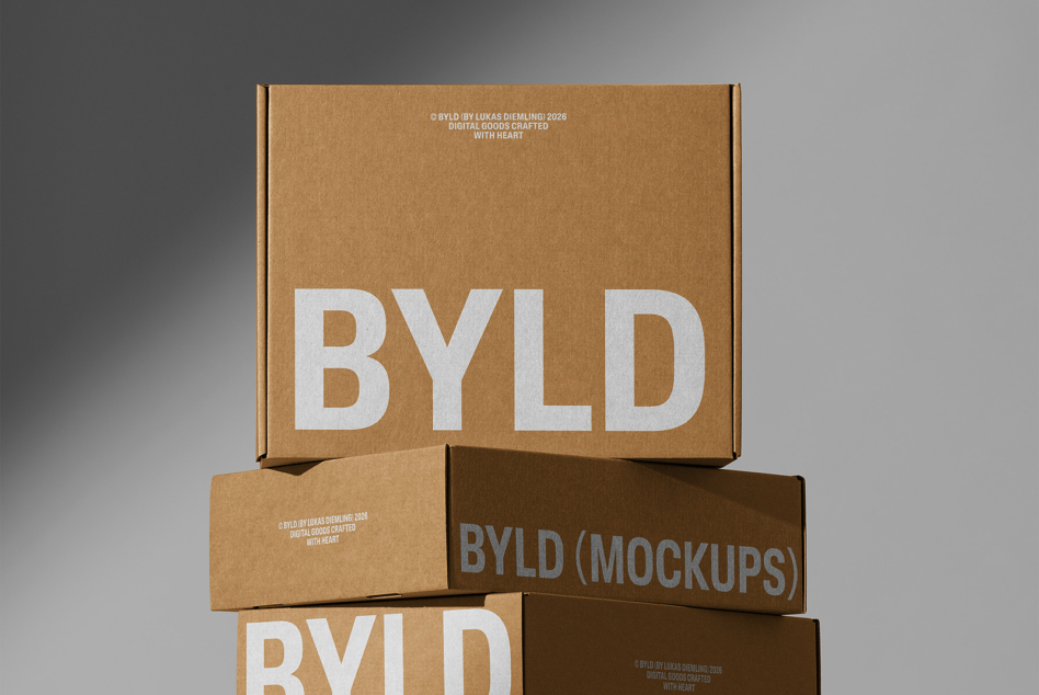 Natural kraft boxes stacked showing BYLD branding on neutral gray background