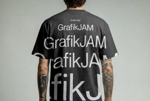 Charcoal tee showing overlapping GrafikJAM text on back