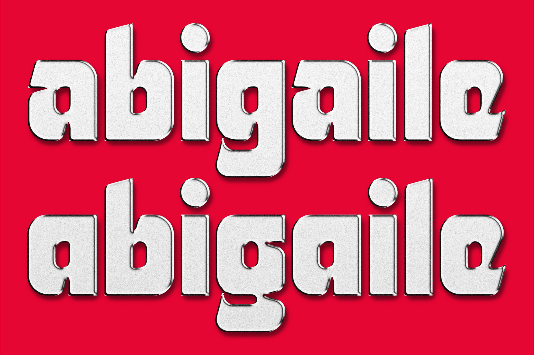 Heavy sans serif typeface in white with thick outlines on bright red backdrop