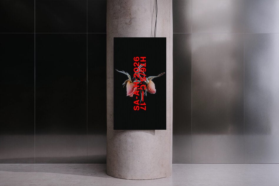 Black poster with red text dried flower design on column