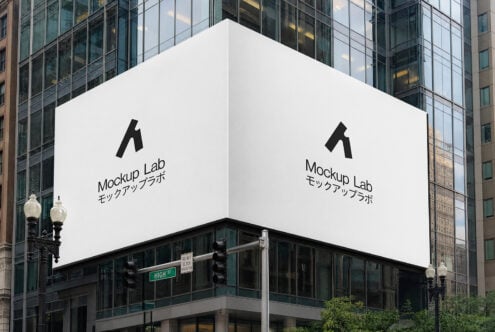 Corner building billboard mockup with Mockup Lab logo on urban street