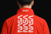 Red jacket back view with NASA neck label, geometric wavy design across back