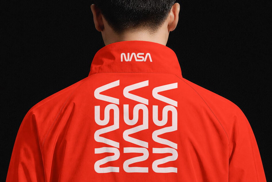 Red jacket back view with NASA neck label, geometric wavy design across back