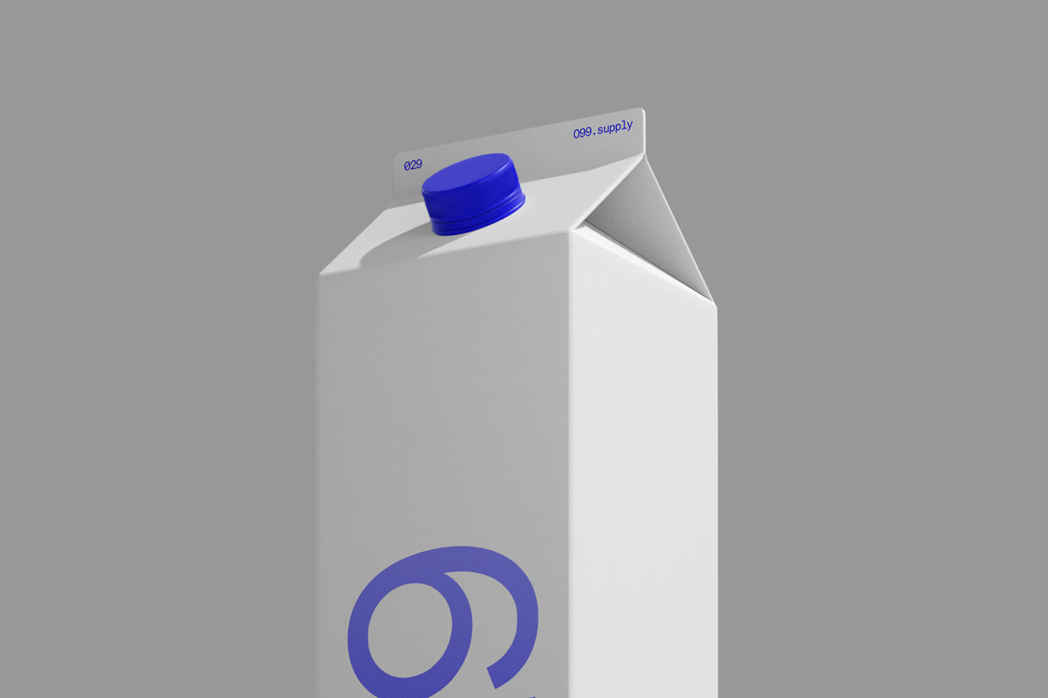 Milk carton mockup with blue cap, white box, blue logo badge on front, gray background