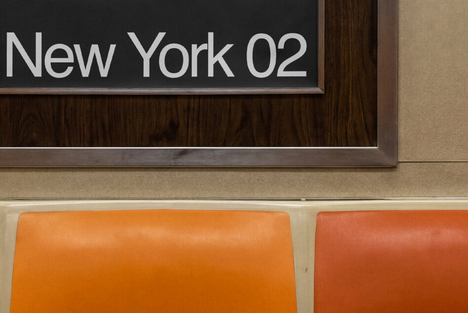 New York 02 poster mockup mounted on dark wood with orange seating