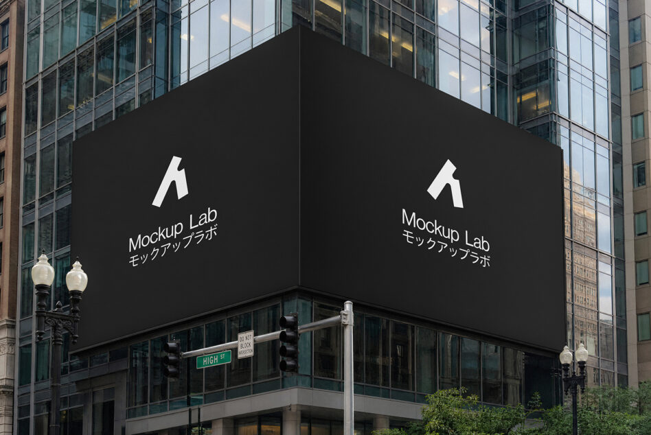 Large black billboard on urban corner building displaying Mockup Lab logo with bilingual text