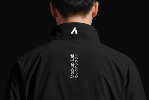 Black jacket back view showing vertical text logo down center of back