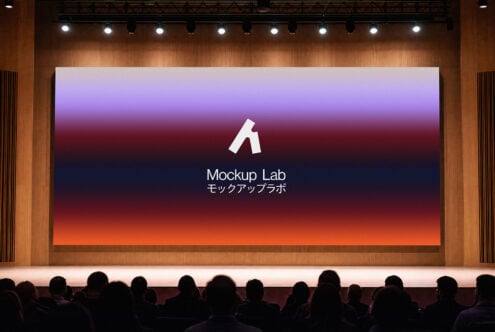 Theater projection screen showing purple to orange gradient with audience below
