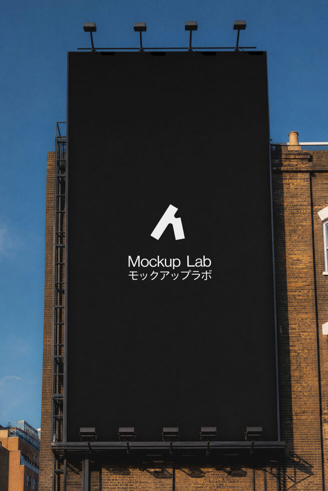 Black billboard against blue sky displaying white Mockup Lab logo with text
