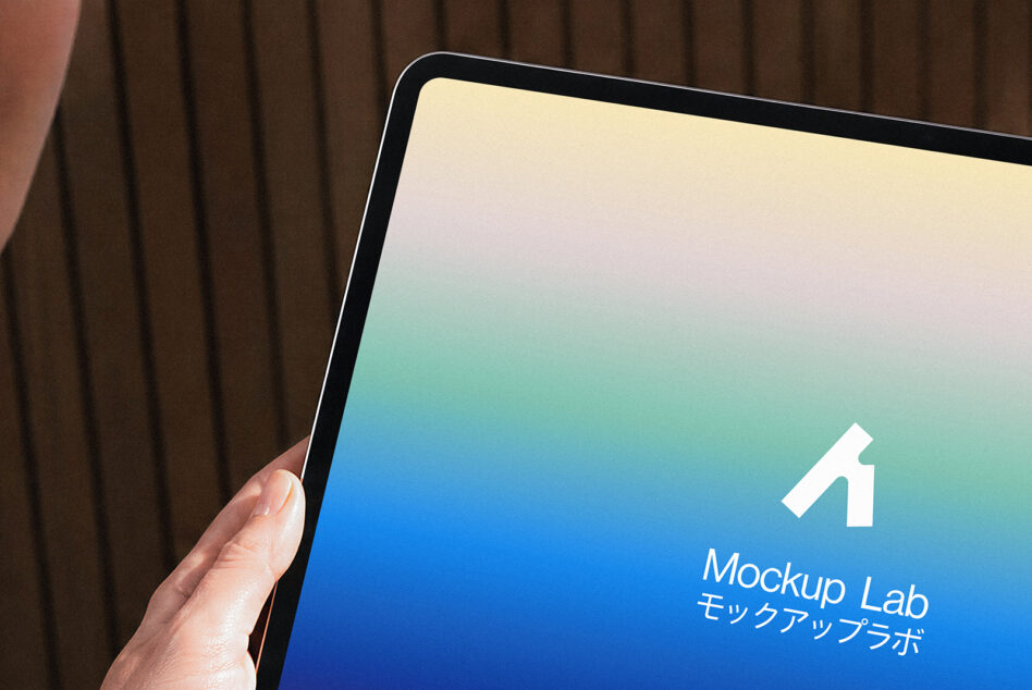 Tablet mockup with cream to teal gradient, held at angle against brown curtains with logo onscreen