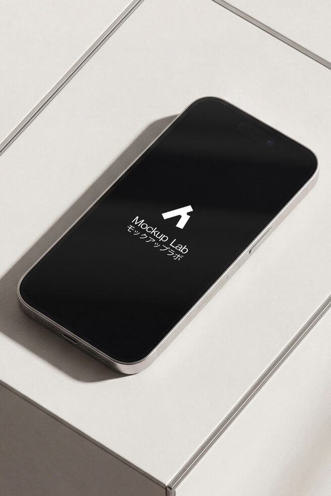 Silver iPhone showing black screen with Mockup Lab logo centered