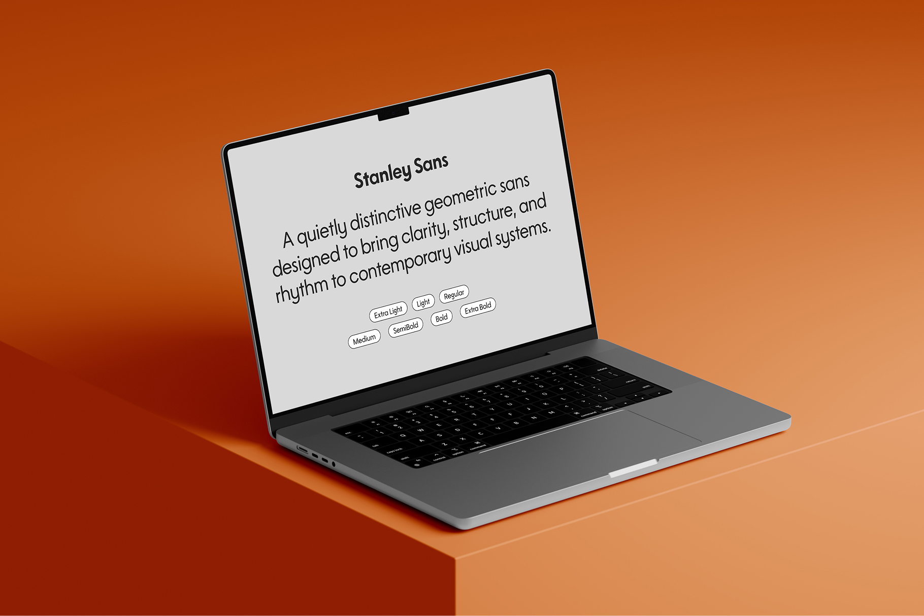 Laptop mockup displaying Stanley Sans font description with weight variants on orange background