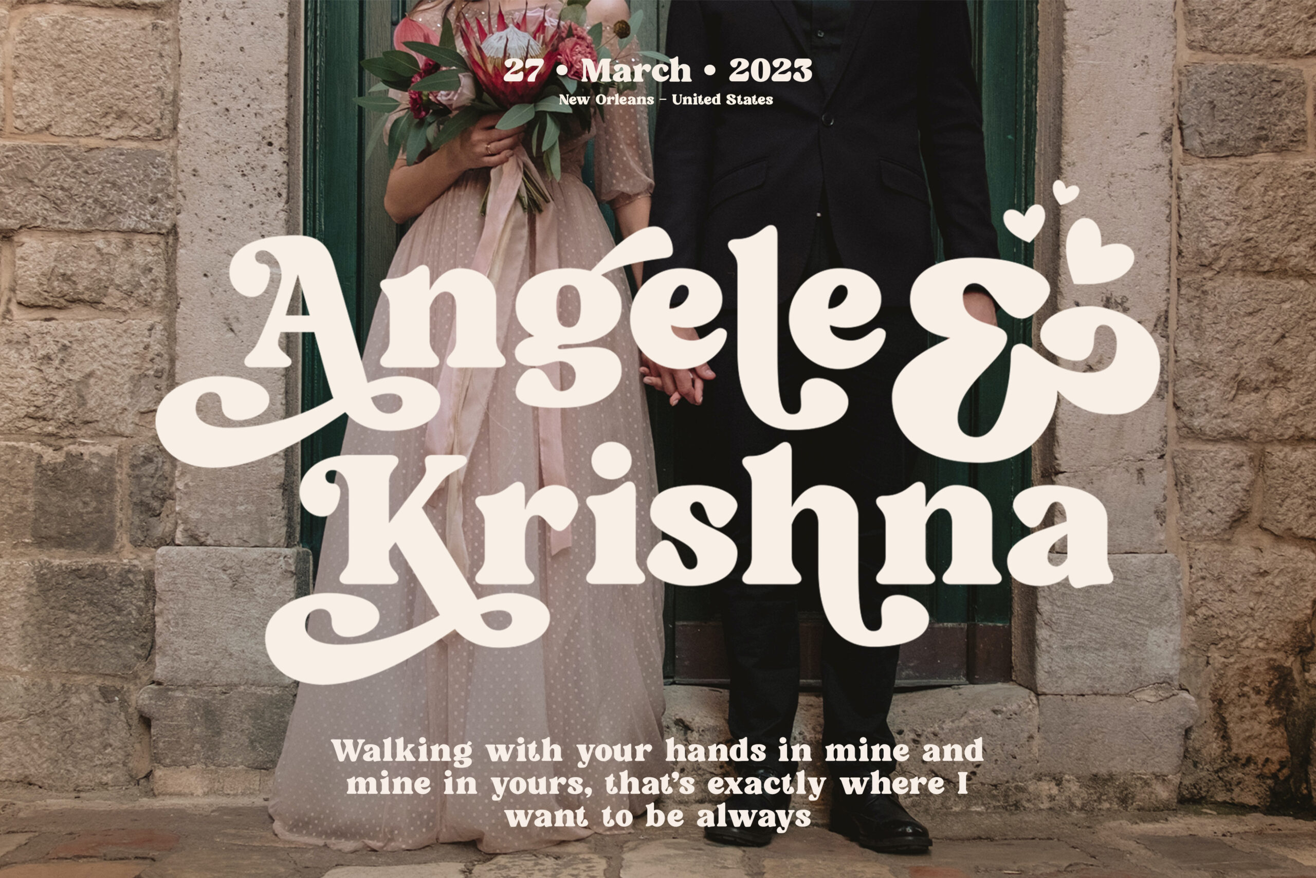 Couple at stone doorway holding red flowers with white script overlay for wedding names