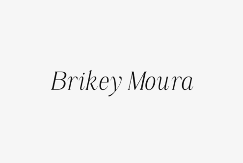 Brikey Moura in delicate serif italic style
