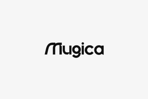 Mugica geometric sans serif logotype in black on light gray background